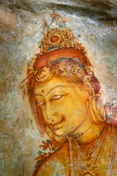 Fresco op de muur van Sigiriya-rots, in het Matale-district van Sri Lanka. Deze 370 meter hoge lavakoepel van een oude vulkaan is beroemd om het versterkte paleiscomplex, gebouwd tijdens het bewind van koning Kasyapa.